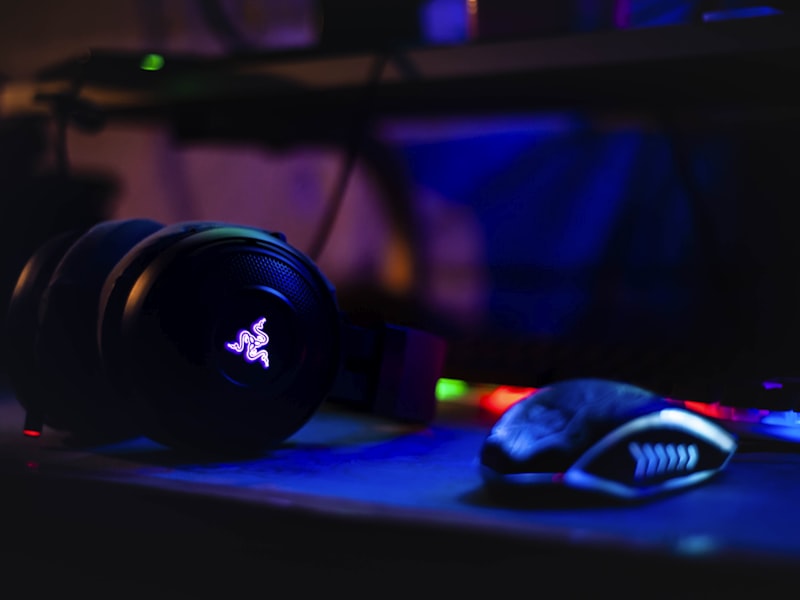 A row of high-end gaming PCs with RGB lighting